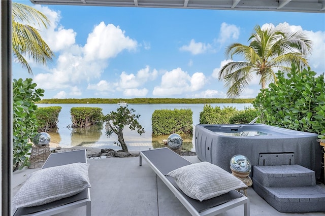 view of patio / terrace with a water view