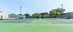 view of sport court with fence