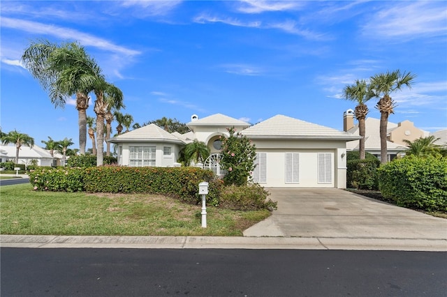 view of front of property with a front lawn