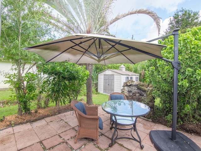 view of patio / terrace with a storage unit