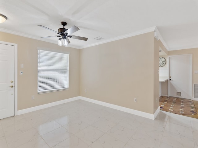 interior space with ceiling fan and crown molding