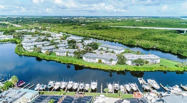 drone / aerial view with a water view