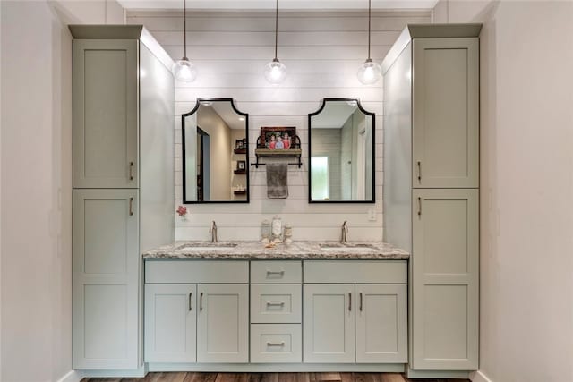 bathroom with vanity and hardwood / wood-style flooring