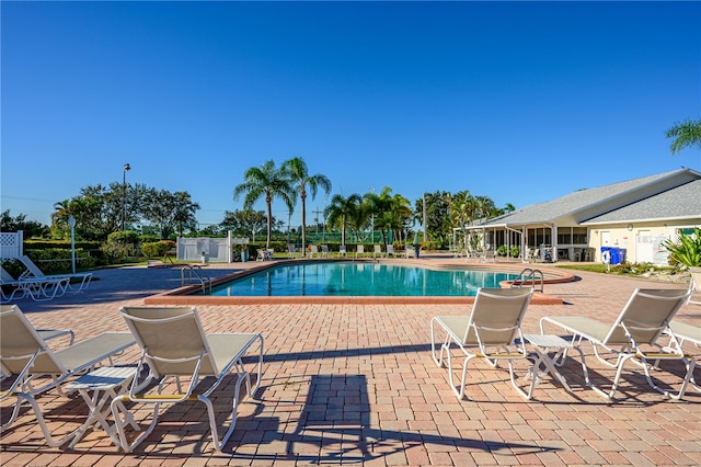 view of pool featuring a patio area