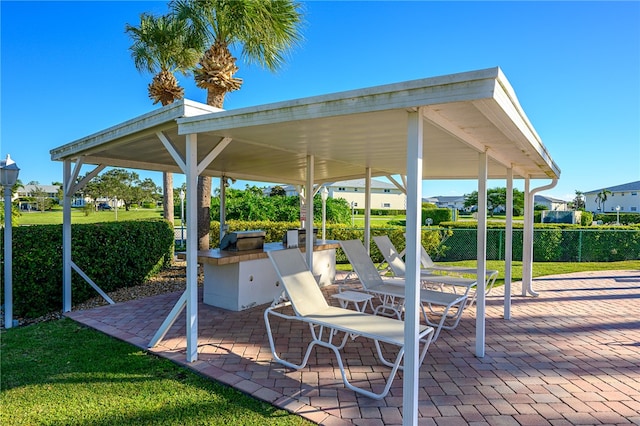 view of patio featuring an outdoor kitchen