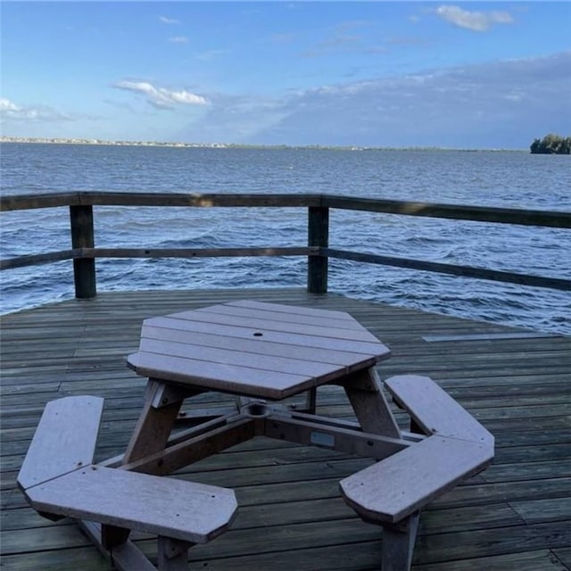 dock area featuring a water view