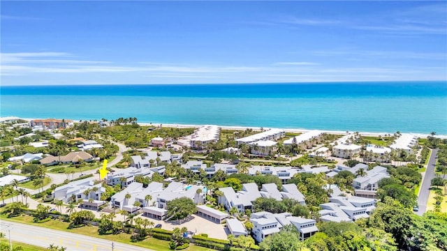 drone / aerial view with a residential view and a water view