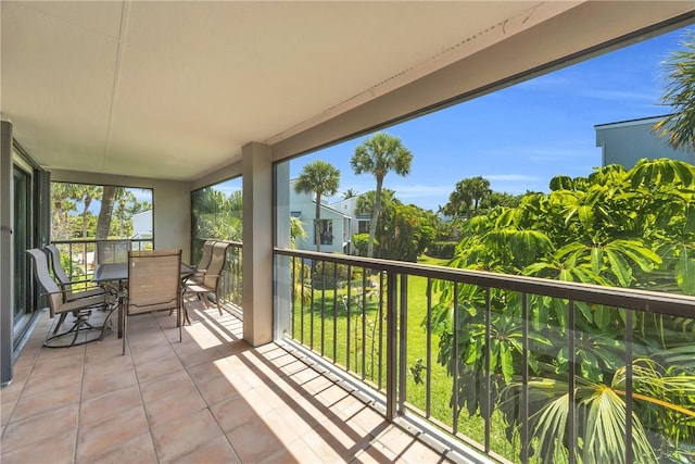 balcony featuring outdoor dining space