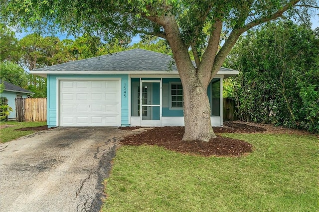 1545 22nd Ave SW, Vero Beach, FL 32962 - single story home featuring driveway, roof with shingles, and an attached garage