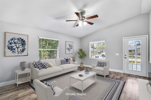 1545 22nd Ave SW, Vero Beach, FL 32962 - living area with vaulted ceiling, ceiling fan, and wood finished floors