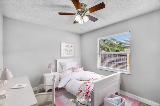 1545 22nd Ave SW, Vero Beach, FL 32962 - bedroom with a textured ceiling and a ceiling fan