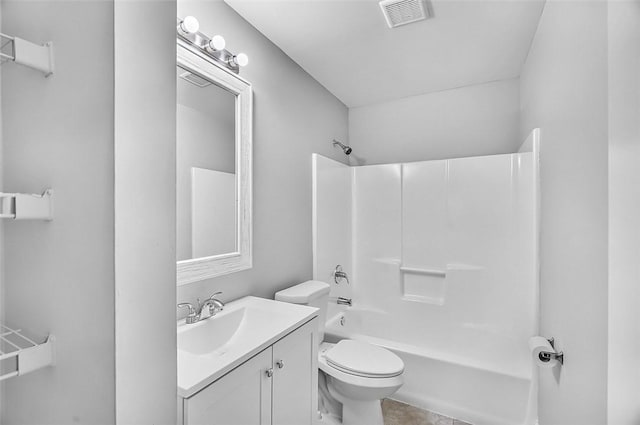 1545 22nd Ave SW, Vero Beach, FL 32962 - bathroom featuring vanity, washtub / shower combination, and tile patterned flooring
