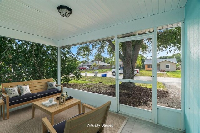 1545 22nd Ave SW, Vero Beach, FL 32962 - sunroom featuring outdoor lounge area