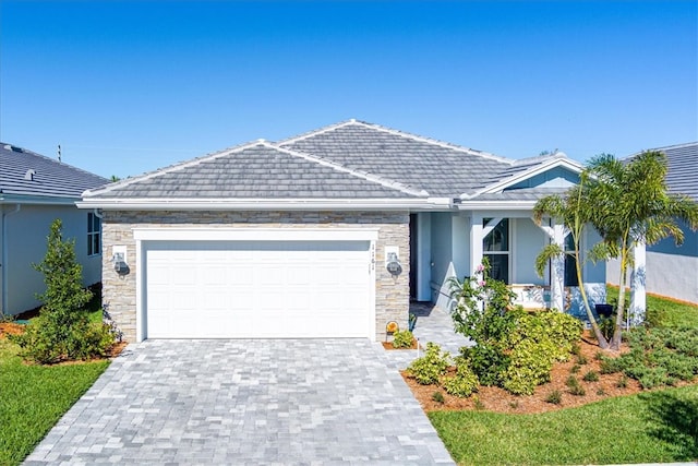 ranch-style home featuring a garage