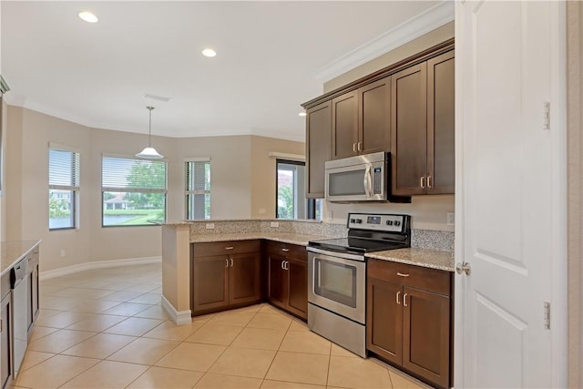 kitchen featuring kitchen peninsula, stainless steel appliances, a wealth of natural light, and light stone counters