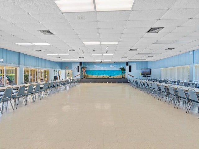 miscellaneous room with visible vents and a drop ceiling