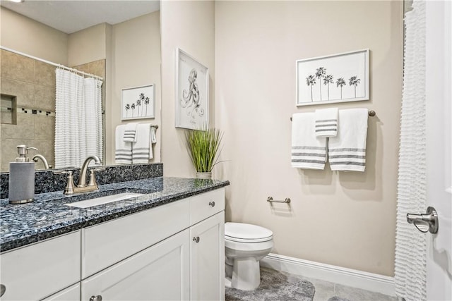 bathroom featuring tile patterned floors, walk in shower, vanity, and toilet