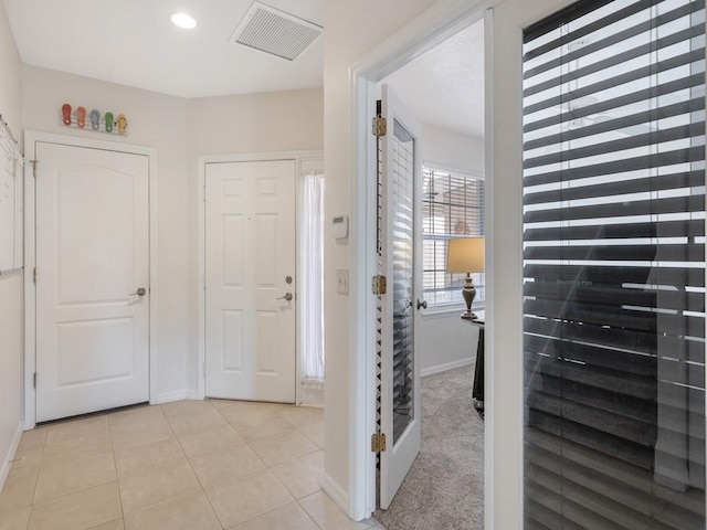 view of tiled entrance foyer