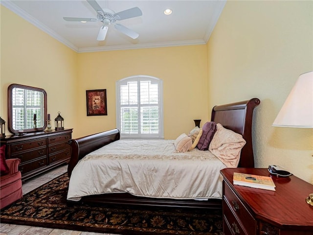 bedroom with light tile patterned floors, crown molding, and ceiling fan