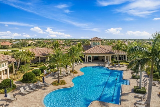 community pool featuring a patio area