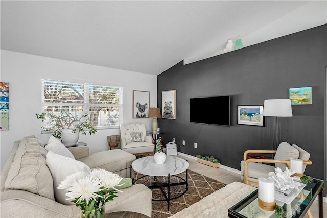 tiled living room with lofted ceiling and baseboards