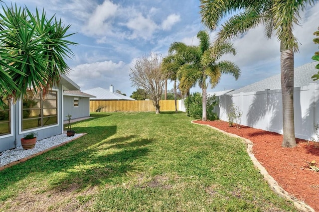 view of yard featuring a fenced backyard