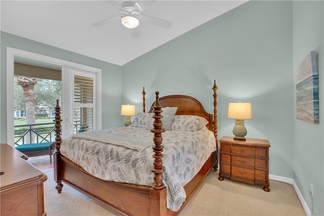 bedroom with access to exterior, vaulted ceiling, light colored carpet, and ceiling fan