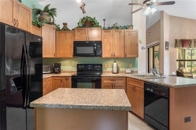 kitchen with sink, black appliances, light tile patterned floors, a kitchen island, and lofted ceiling