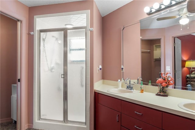 bathroom with vanity and an enclosed shower