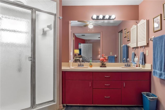 bathroom featuring vanity, walk in shower, and ceiling fan