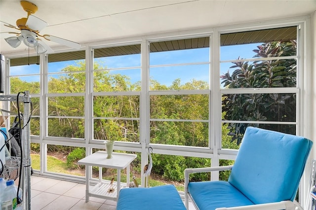 sunroom / solarium with ceiling fan