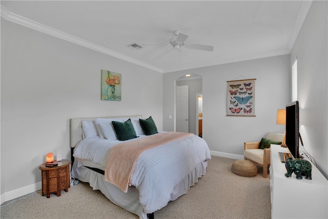 bedroom with ensuite bathroom, ceiling fan, crown molding, and carpet floors