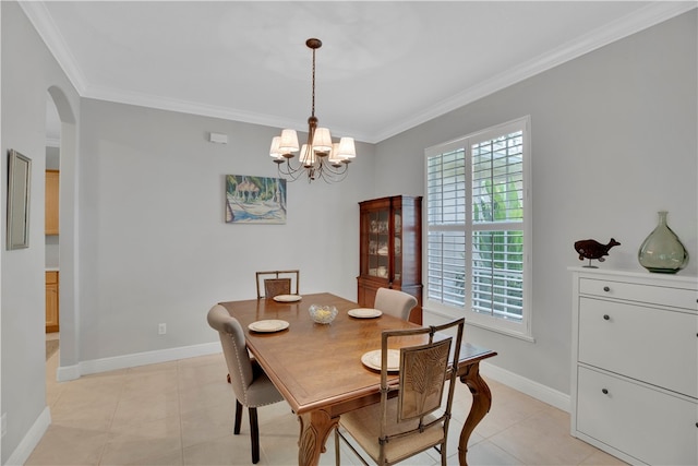 dining area featuring a chandelier, light tile patterned floors, and ornamental molding