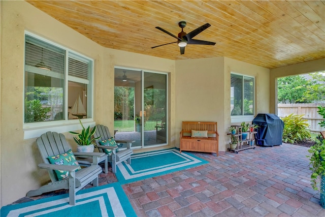 view of patio featuring a grill and ceiling fan