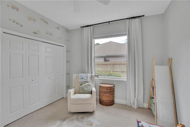 6770 49th Ct, Vero Beach, FL 32967 - sitting room with carpet flooring and baseboards