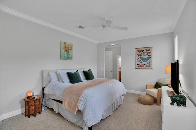 6770 49th Ct, Vero Beach, FL 32967 - bedroom with arched walkways, crown molding, baseboards, carpet, and ceiling fan