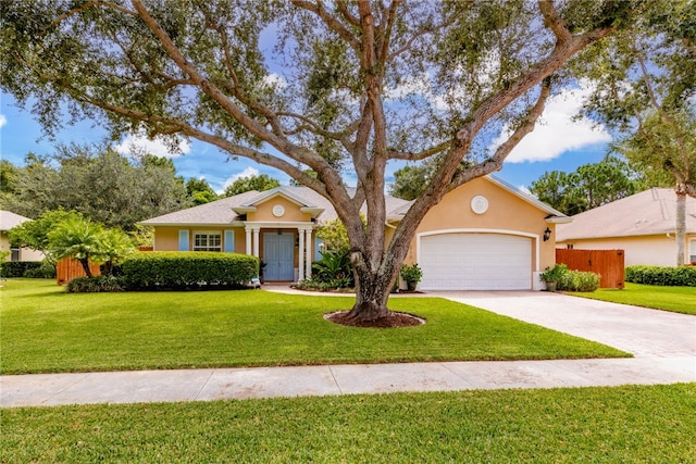 ranch-style home with a garage and a front yard