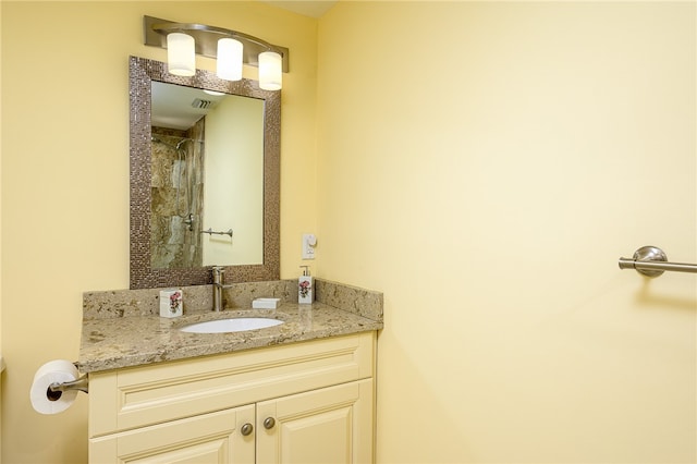 bathroom with vanity and a shower with shower curtain