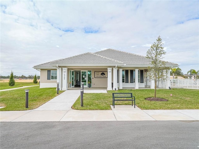 4101 Keeson Cir, Vero Beach, FL 32967 - view of front of house featuring stucco siding and a tile roof