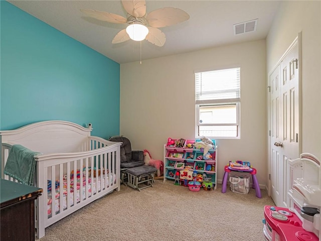 4101 Keeson Cir, Vero Beach, FL 32967 - carpeted bedroom with a nursery area and a ceiling fan