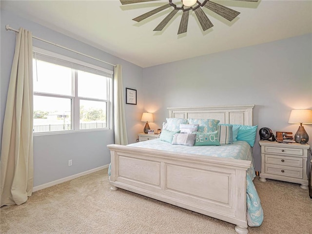 4101 Keeson Cir, Vero Beach, FL 32967 - bedroom with light colored carpet, baseboards, and a ceiling fan