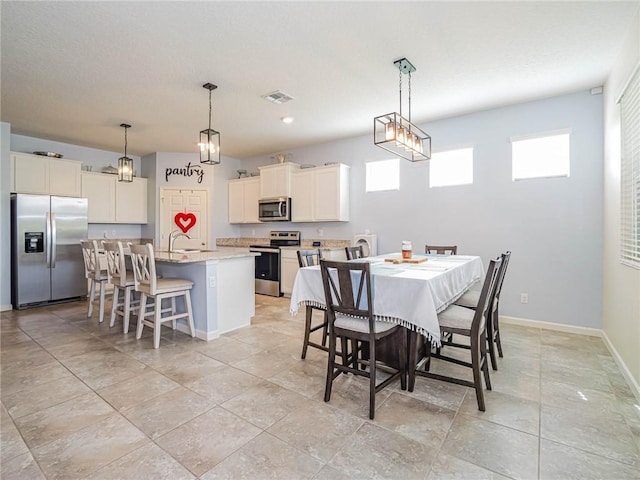 4101 Keeson Cir, Vero Beach, FL 32967 - dining space with baseboards