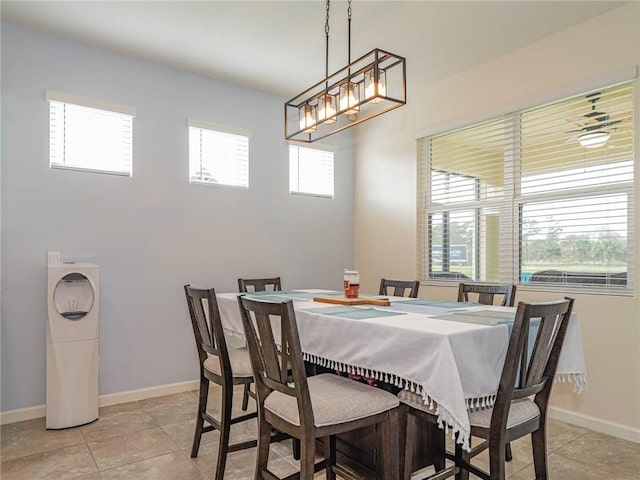 4101 Keeson Cir, Vero Beach, FL 32967 - dining area featuring baseboards and a chandelier