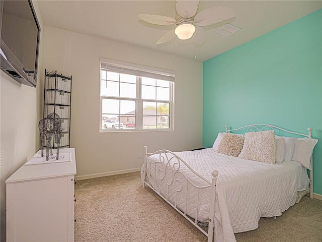 4101 Keeson Cir, Vero Beach, FL 32967 - bedroom with carpet floors, baseboards, and ceiling fan