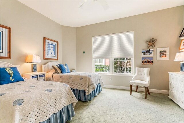 860 Saint James Ln, Vero Beach, FL 32967 - bedroom with baseboards, light carpet, and a ceiling fan