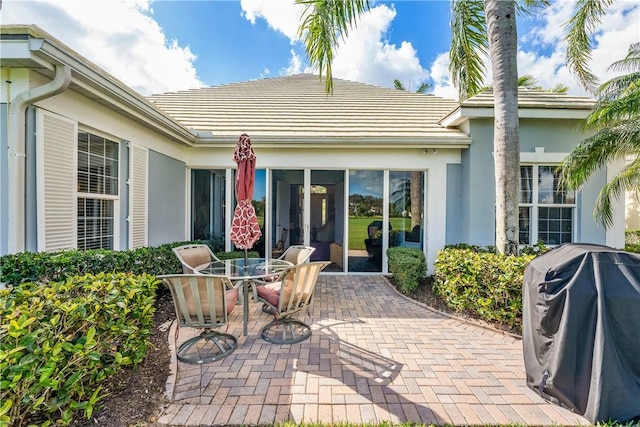 860 Saint James Ln, Vero Beach, FL 32967 - view of patio featuring a grill and outdoor dining space
