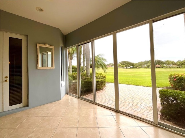 860 Saint James Ln, Vero Beach, FL 32967 - doorway featuring light tile patterned floors and golf course view