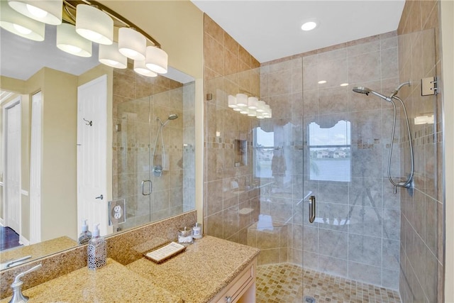 bathroom featuring vanity and walk in shower