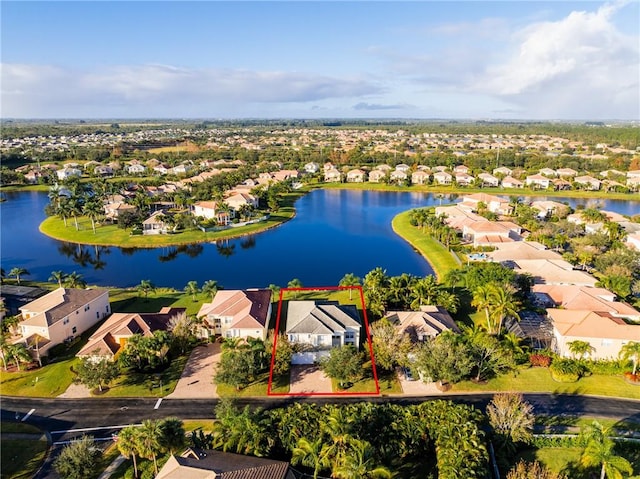 drone / aerial view with a water view