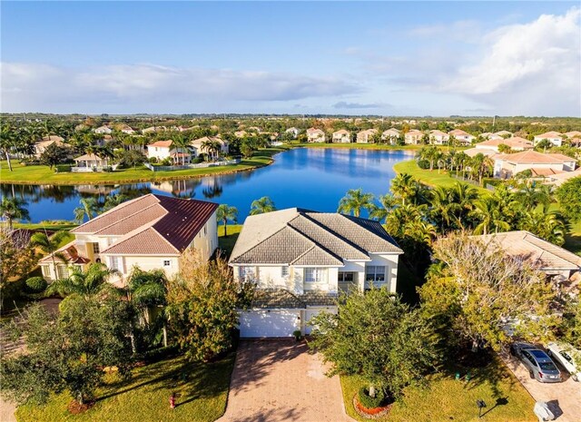 bird's eye view with a water view